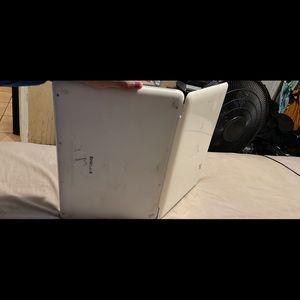 MacBook, white, has a charger with it